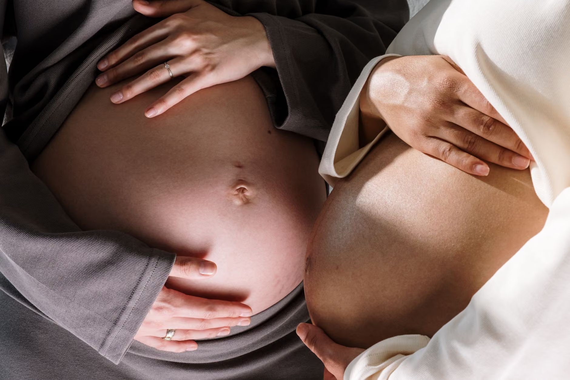 Expectant mothers embracing the journey of pregnancy